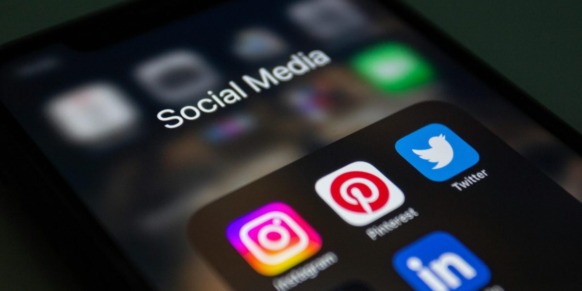 A smartphone screen displaying popular social media applications like Instagram and Twitter.